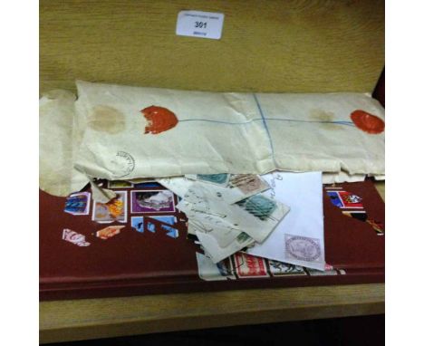 A quantity of Victorian British and East India stamps, loose and on envelopes (some with Royal Horse Artillery embossing), pr