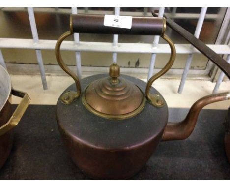 A vintage copper kettle.