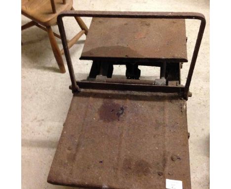 Vintage cast iron potato scales.