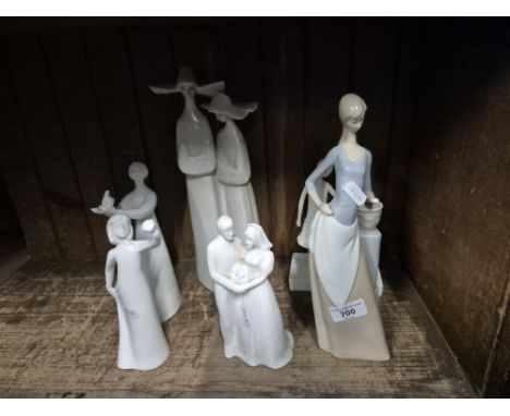 Five Lladro/Nao/Royal Doulton figurines and another. 