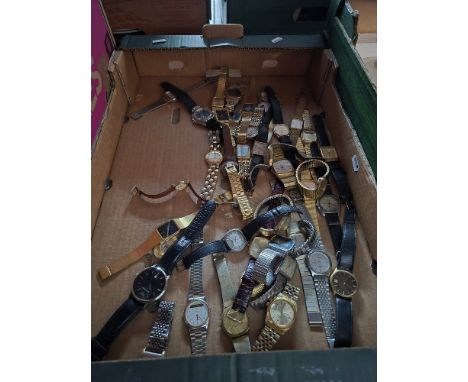 A box of wristwatches including Seiko, Casio, Pulsar, etc.