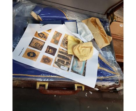 A briefcase of masonic regalia 