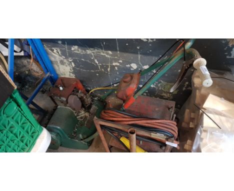 A Suffolk Punch petrol lawn mower, no grass box and aluminium step ladders