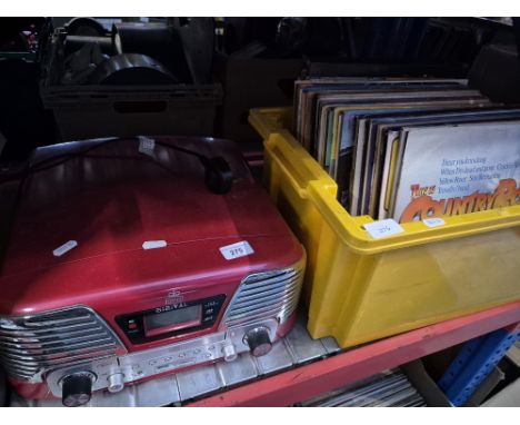 A GPO CD/record player together a box of vinyl records. 