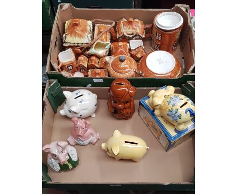 6 money boxes including 3 by Wade together with approximately 16 items of â€˜cottage wareâ€™ including a large bowl 23.5cm di