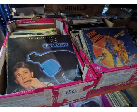 Two boxes of assorted records to include a sealed Star Wars, Air Supply, Billy Joel "An Innocent Man", Wet Wet Wet, Paul McCa