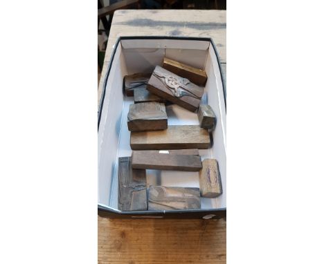 A small box of engraving blocks of engineering tools 