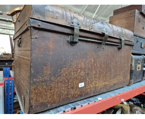 A vintage metal travel trunk. 