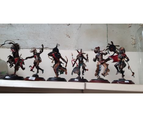 A group of six assorted Franklin Mint bronze Native American figures.Dimensions:- Height is approx 27cm to 29cm.Condition rep