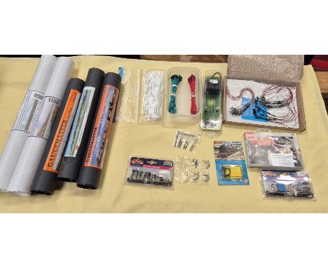 A collection of 00 gauge model railway items, 5 back scenes, Bachman figures and building site items, 6, 9 and 12 volt lighti