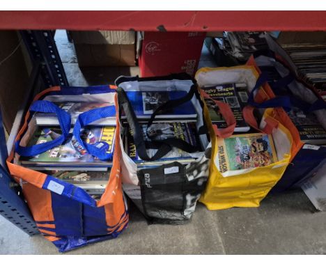 Four bags of Rugby League books including Rothmans Yearbooks, many of the other books are signed.