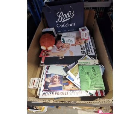 A box of assorted emphemera to include theatre programmes, vintage magazines, newspapers, some first day covers and a small b
