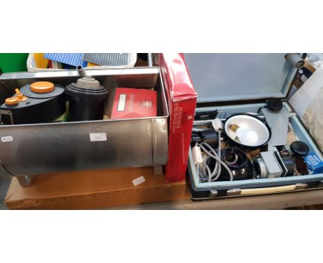 A collection of darkroom equipment to include a Photax dishwarmer, Zenith enlarger and other items.
