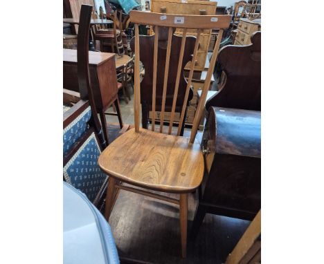An Ercol light elm dining chair, model 608.