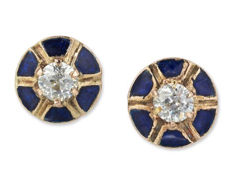 A PAIR OF SOLITAIRE DIAMOND AND BLUE ENAMEL STUD EARRINGS, old-cut diamonds in claw settings, within panelled blue enamel cir