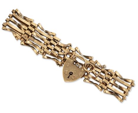 A 9 CARAT GOLD GATE LINK BRACELET, alternating twisted and straight bar links, to a padlock clasp, hallmarked London 1978. Me