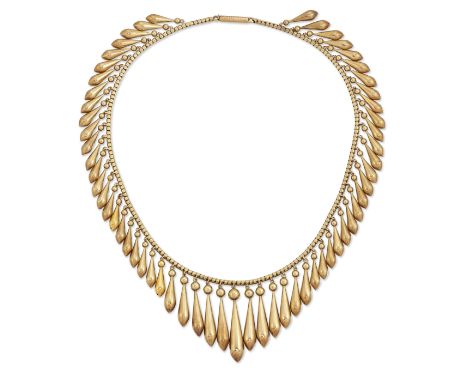 A 19TH CENTURY ARCHEOLOGICAL REVIVAL NECKLACE, of graduated pendant drops to a Brazilian link chain. Longest pendant length 3