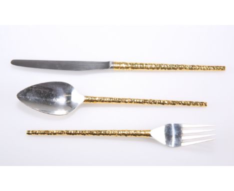 AN ELIZABETH II PARCEL-GILT SILVER CHRISTENING SET,&nbsp;by Stuart Devlin, London 1968, comprising knife, fork and spoon, eac