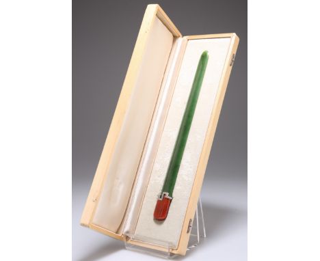AN ART DECO NEPHRITE, ENAMEL AND DIAMOND PAGE TURNER, the nephrite blade mounted with an orange-red guilloche enamel handle w