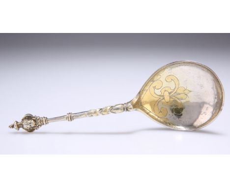 A 17TH CENTURY NORWEGIAN PARCEL-GILT SILVER SPOON, Bergen, with pear-shaped bowl and struck to either side of the finial with