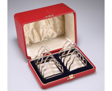 A PAIR OF GEORGE VI SILVER TOAST RACKS,&nbsp;by Davis, Duff &amp; Son, Birmingham 1939, five bars, each a shouldered gothic a