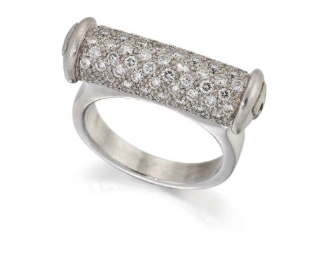 THEO FENNELL: A DIAMOND 'SHAFT' DRESS RING, a cylindrical bar pavé-set with round brilliant-cut diamonds, each end with the T