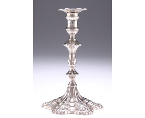 A GEORGE III SILVER TAPERSTICK,&nbsp;by Ebenezer Coker (probably), London 1768, cast, the waisted knopped stem raised on a st