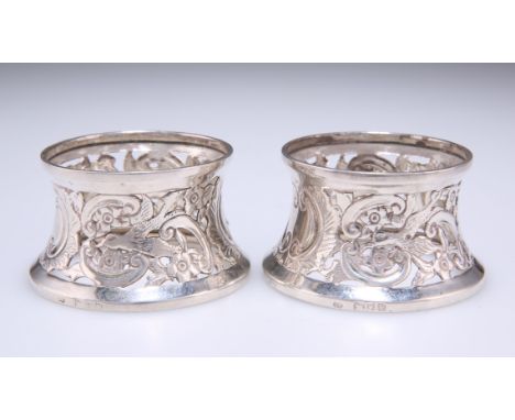 A PAIR OF VICTORIAN SILVER NOVELTY NAPKIN RINGS,&nbsp;by Job Frank Hall, London 1895, in the form of dish rings, the piercewo