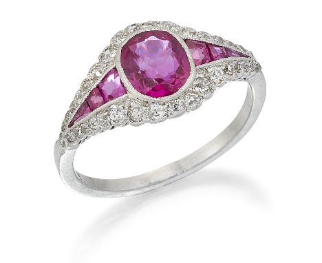 A BURMA RUBY AND DIAMOND RING, a cushion-cut ruby between tapering bands of calibré-cut rubies and a border of old-cut diamon