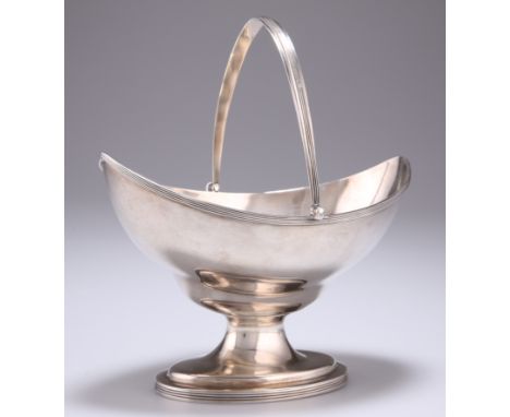 A GEORGE III SILVER SWING HANDLED SUGAR BASKET,&nbsp;by Peter &amp; Ann Bateman,&nbsp;London 1791, of plain navette form, rai