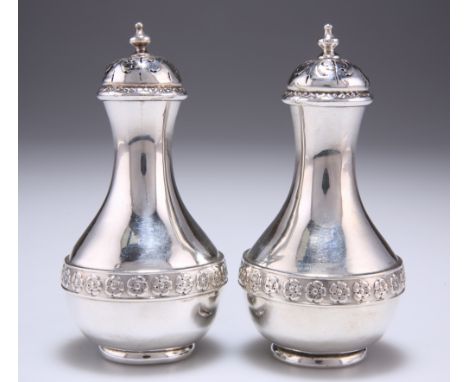 A PAIR OF VICTORIAN SILVER PEPPERS,&nbsp;by Jesse Earls, London 1881, of baluster form, each with engraved girdle of flowers 