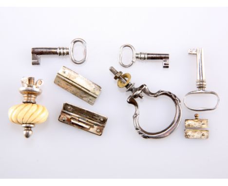 A COLLECTION OF CADDY KEYS, HINGES, ETC., to include a silver and carved ivory knop.