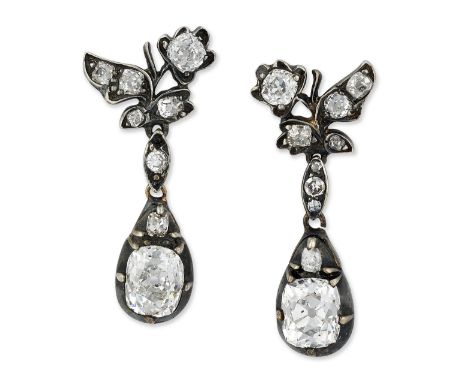 A PAIR OF DIAMOND PENDANT EARRINGS, old-cut diamond set foliate tops suspend cushion old-cut diamond drops, in crimped collec