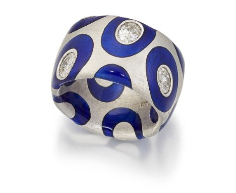 A DIAMOND AND ENAMEL RING, the broad matt polished shank decorated with blue enamel hoop motifs, three inset with oval brilli