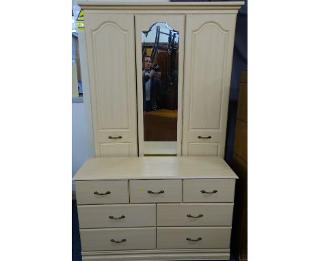 MODERN LIGHT WOOD EFFECT TWO PIECE BEDROOM SUITE of wardrobe with central mirror and lower drawers, 203cms H, 128cms W, 54cms