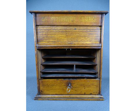 WOODEN DESKTOP STATIONERY CABINET having roller shutter front and drawer with contents