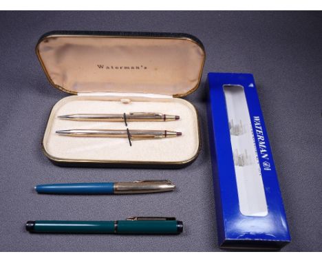 WATERMAN - Vintage 1950s teal and grey Waterman CF fountain pen with gold trim, a rolled gold pinstripe patterned cap and 14c