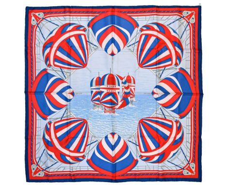 Twill scarf "Spinnaker" HERMES 90 cm scarf in twill silk, light blue background and red frame, signed Julie Abadie. Splendid 
