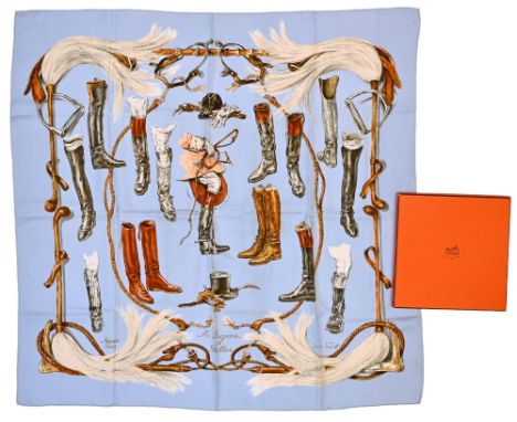 Twill scarf "A propos de bottes" HERMES 90 cm scarf in twill silk, baby blue background and frame, signed Xavier de Poret. In