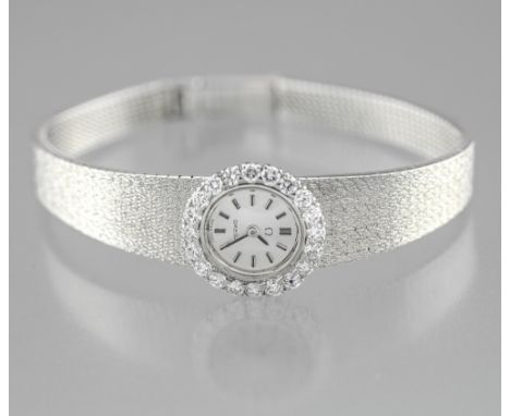  BETWEEN 1950 AND 1979 OMEGA Ladies' wristwatch in white gold Wristwatch in white 18-carat gold. Bezel set with twenty brilli