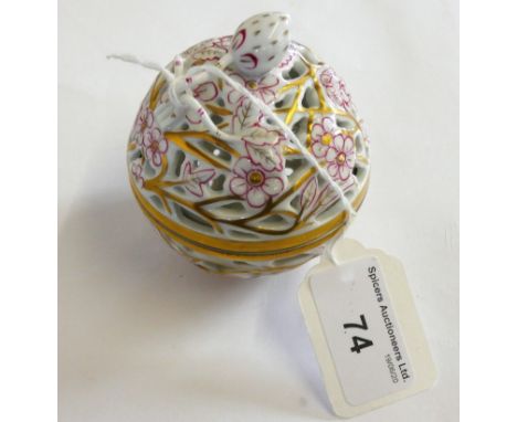 A Herend Hungary handpainted reticulated potpourri trinket box, with a white raspberry finial, No. 6241, diameter 7cm.