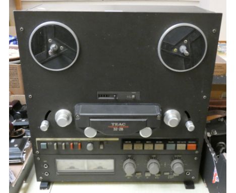 A Teal Tascam series reel to reel 32-2B recorder.