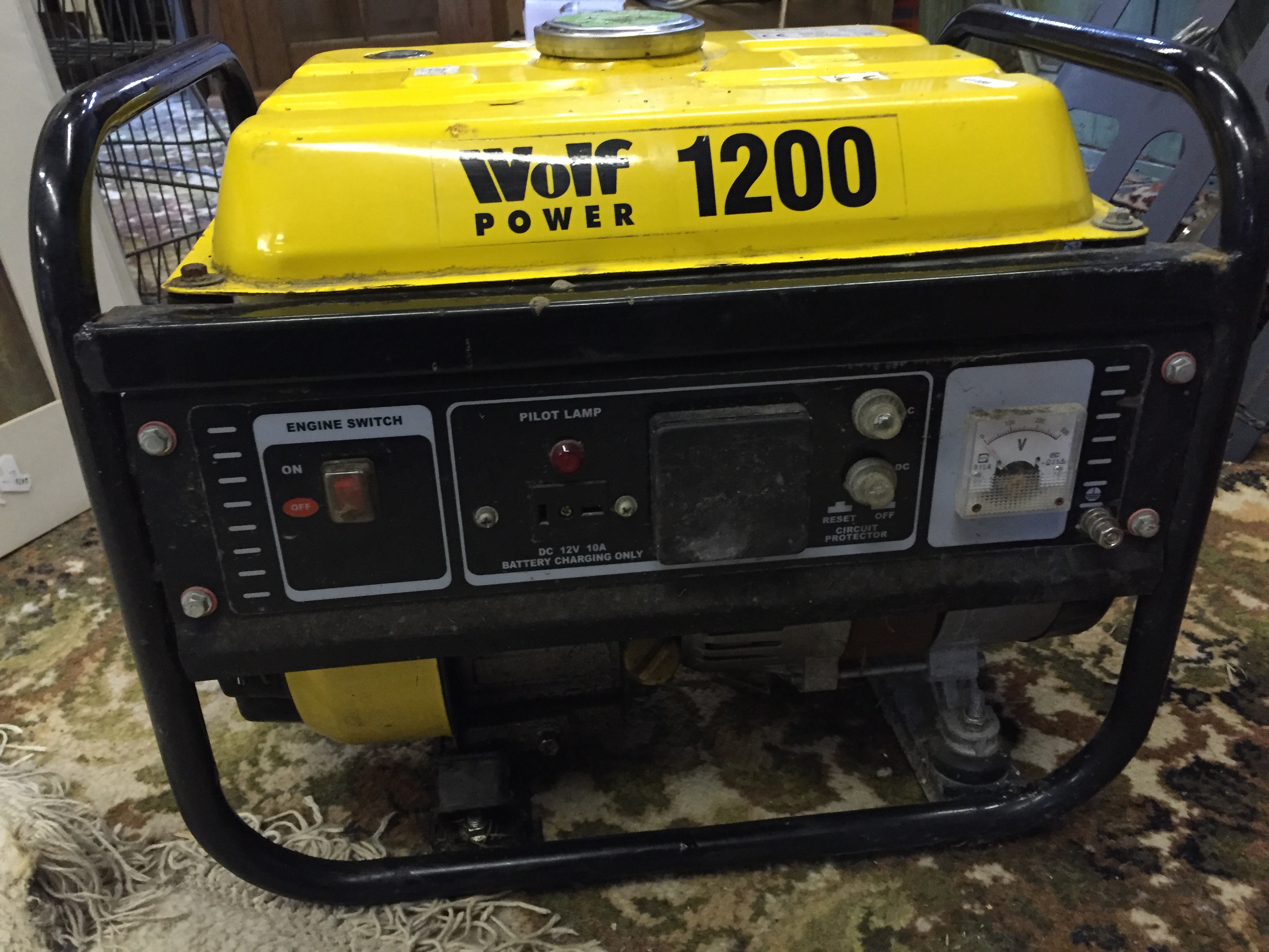 A diesel 3 Horse power 4 stroke engine Wolf Power 1200 generator.