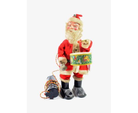 Made In Japan Battery Operated Remote Control Santa Claus playing a drum and bell, with celluloid face (G-F, a little dirty)