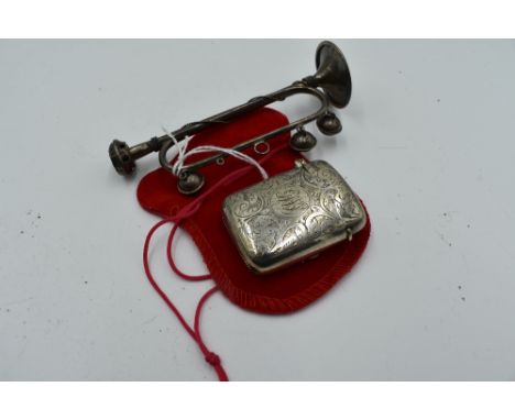 An Edwardian silver miniature trumpet of traditional form, (missing two bells), London 1901, Samuel Foskett, and a white meta