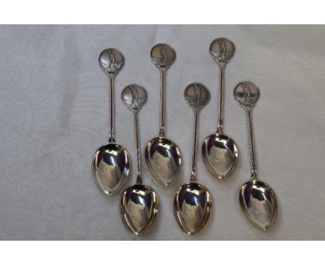Six 1930's HM silver teaspoons having moulded golf scenes to terminals
Weight Approx:&nbsp; 96g