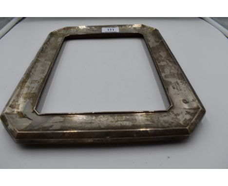A silver photograph frame having engraved ribbon and bow swag decoration, Birmingham 1942, Syner &amp; Beddoes, missing easel