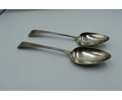 A Georgian silver tablespoon of plain form, Exeter 1803, Richard Jenkins and another similar, Exeter 1802, possibly Richard F