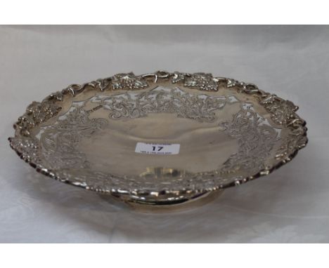 An early 20th century silver tazza having pierced and moulded grape vine decoration, Sheffield 1927, Levesley Brothers, retai