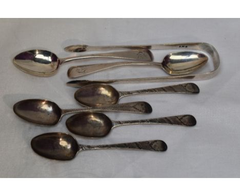 A selection of Georgian silver including teaspoons and a pair of sugar nips of plain form
Weight Approx: 108.6g